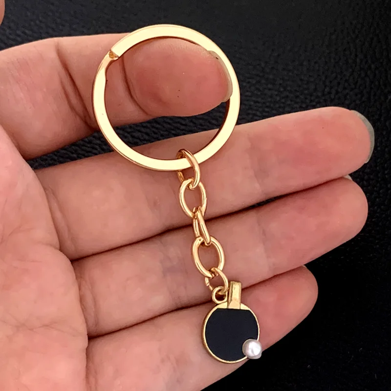 黒赤スポーツ卓球テニスキーチェーンクリエイティブ卓球バットキ - Table Tennis Keychain のレビューと価格